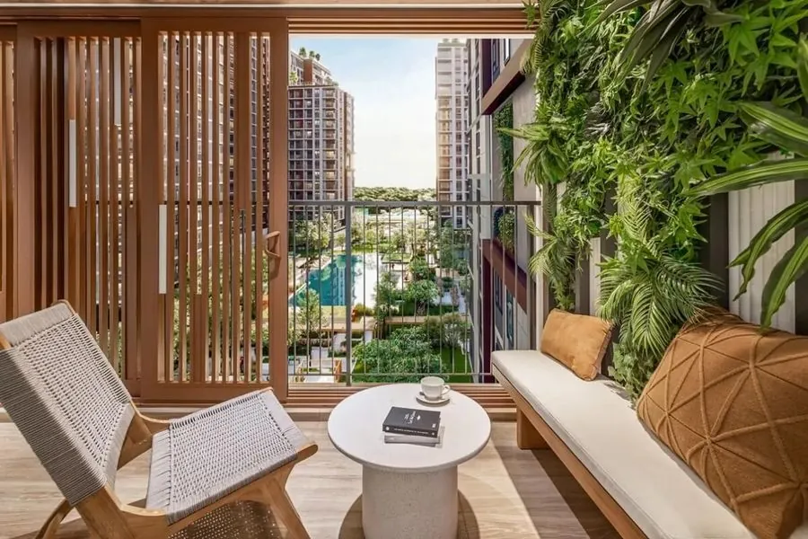 Elysian Lanai outdoor area with timber screen, bench and a view over the pool and gardens